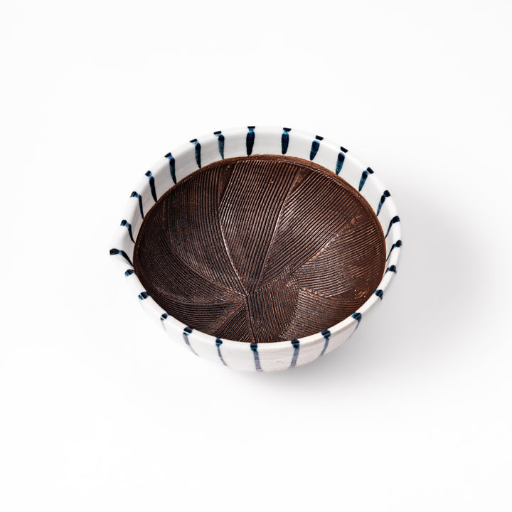 White ceramic suribachi mortar with vertical blue stripes and a textured brown interior, ideal for grinding sesame seeds and traditional Japanese seasonings.