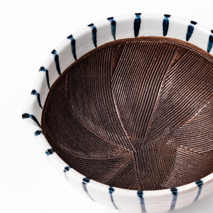 White ceramic suribachi mortar with vertical blue stripes and a textured brown interior, ideal for grinding sesame seeds and traditional Japanese seasonings.