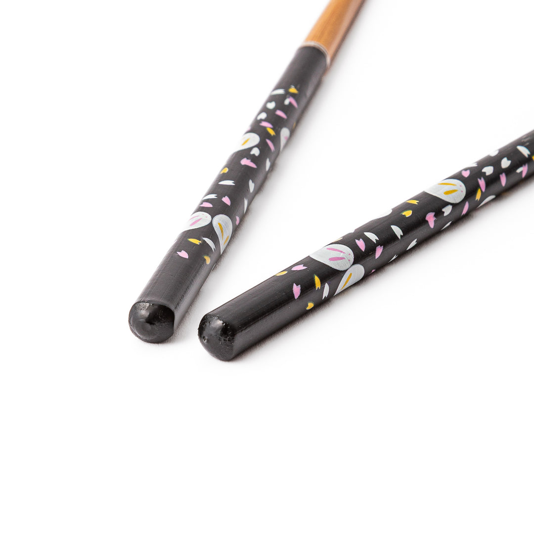 Bunny portable Japanese travel chopsticks featuring a black handle with cute rabbit and sakura cherry blossom patterns