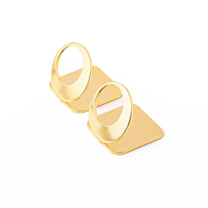 Set of two elegant celestial gold chopstick rests featuring unique hollow circle full moon shapes luxury hashioki