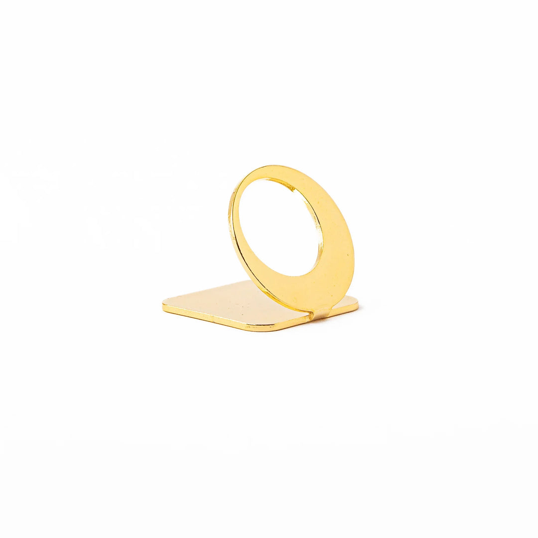 Celestial gold chopstick rest showing unique curved open circle design metallic elegant hashioki holder