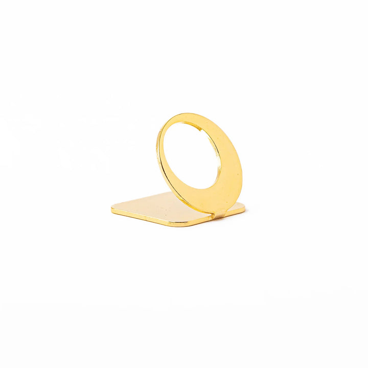 Celestial gold chopstick rest showing unique curved open circle design metallic elegant hashioki holder