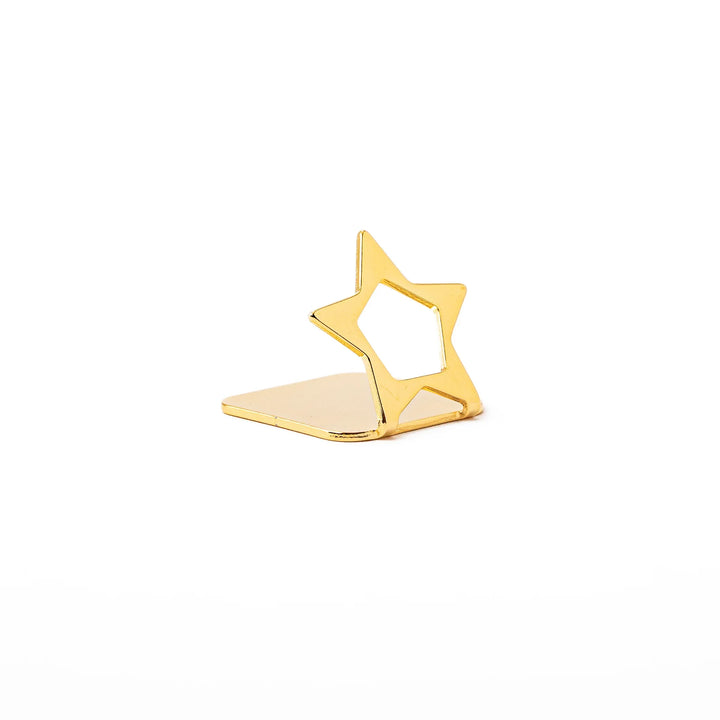 Elegant celestial gold chopstick rest showing unique hollow star design metallic luxury hashioki holder