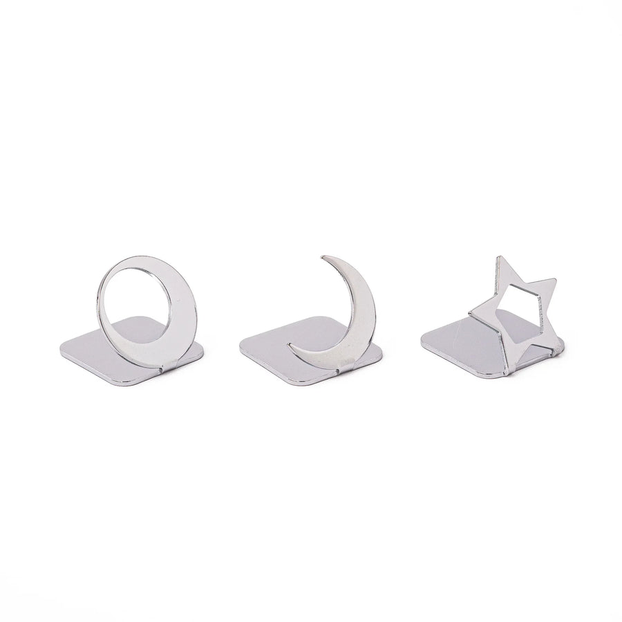 Three modern Japanese celestial silver chopstick rests in unique moon and star shapes sleek metal hashioki set