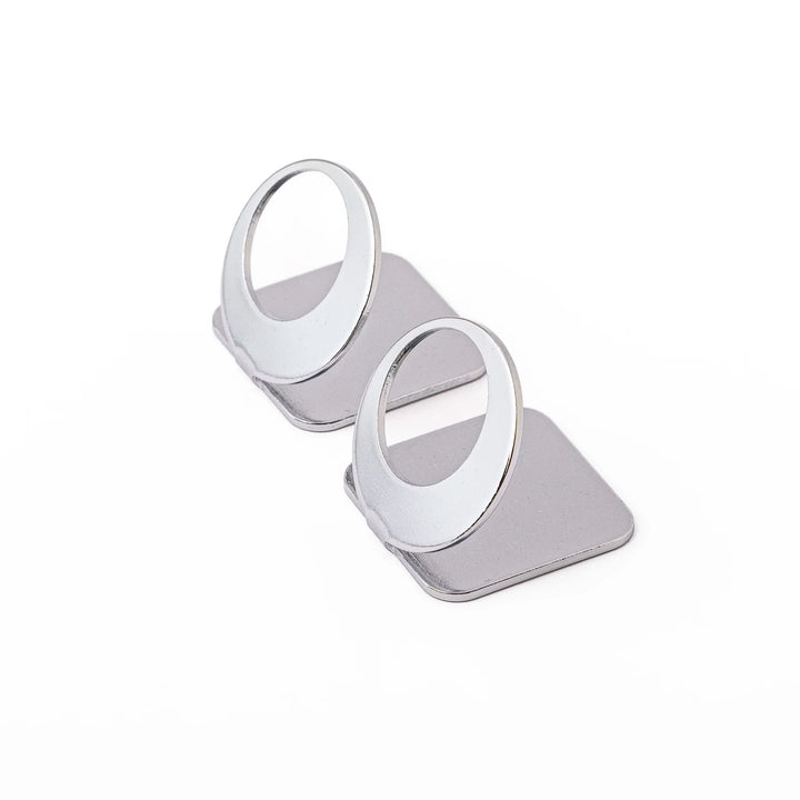 Set of two elegant celestial silver chopstick rests featuring unique hollow circle full moon shapes sleek metal hashioki
