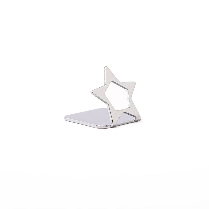 Elegant celestial silver chopstick rest showing unique hollow star design sleek metallic luxury hashioki holder