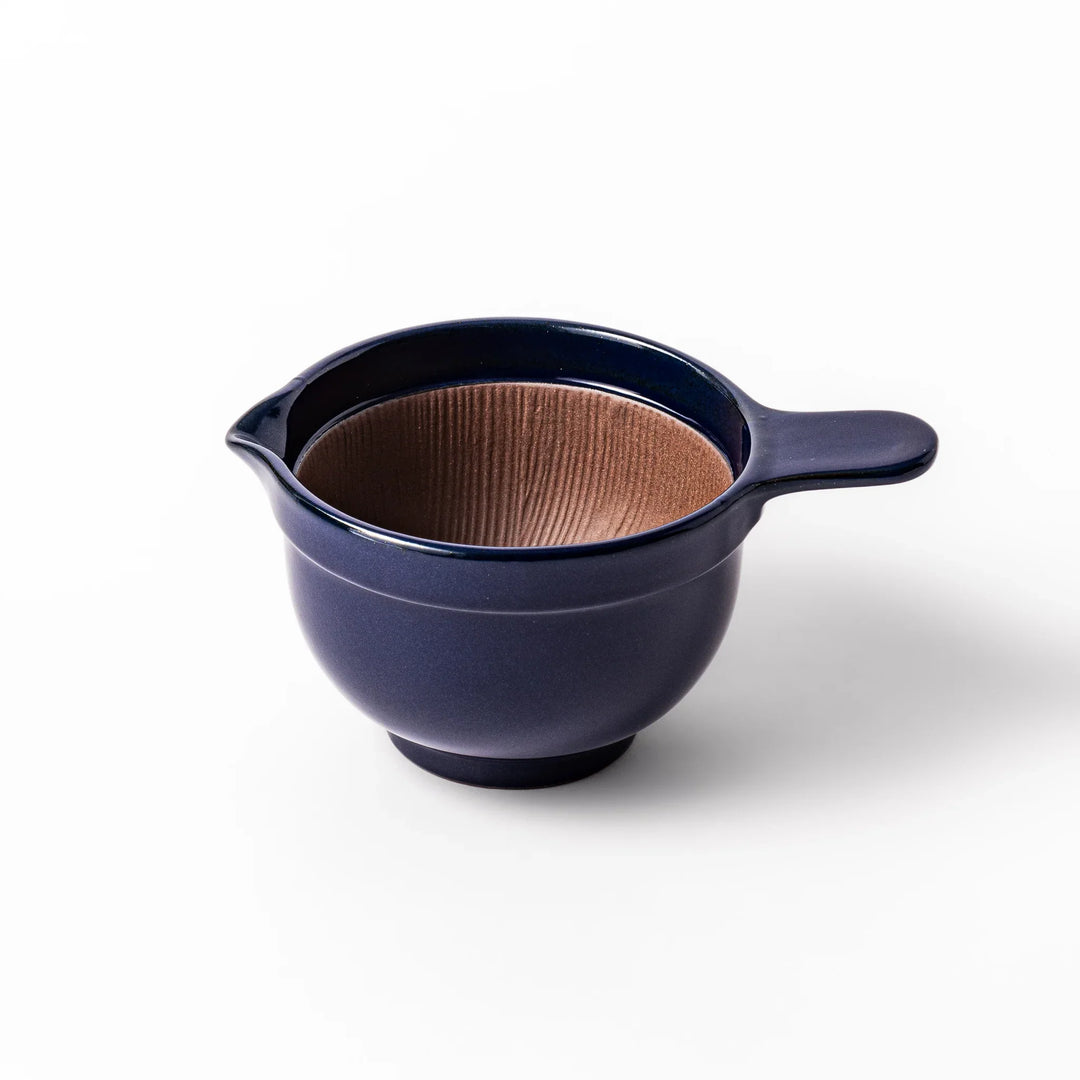 Deep blue ceramic natto suribachi bowl with ridged brown interior and side handle, perfect for mixing natto or grinding small ingredients with ease.
