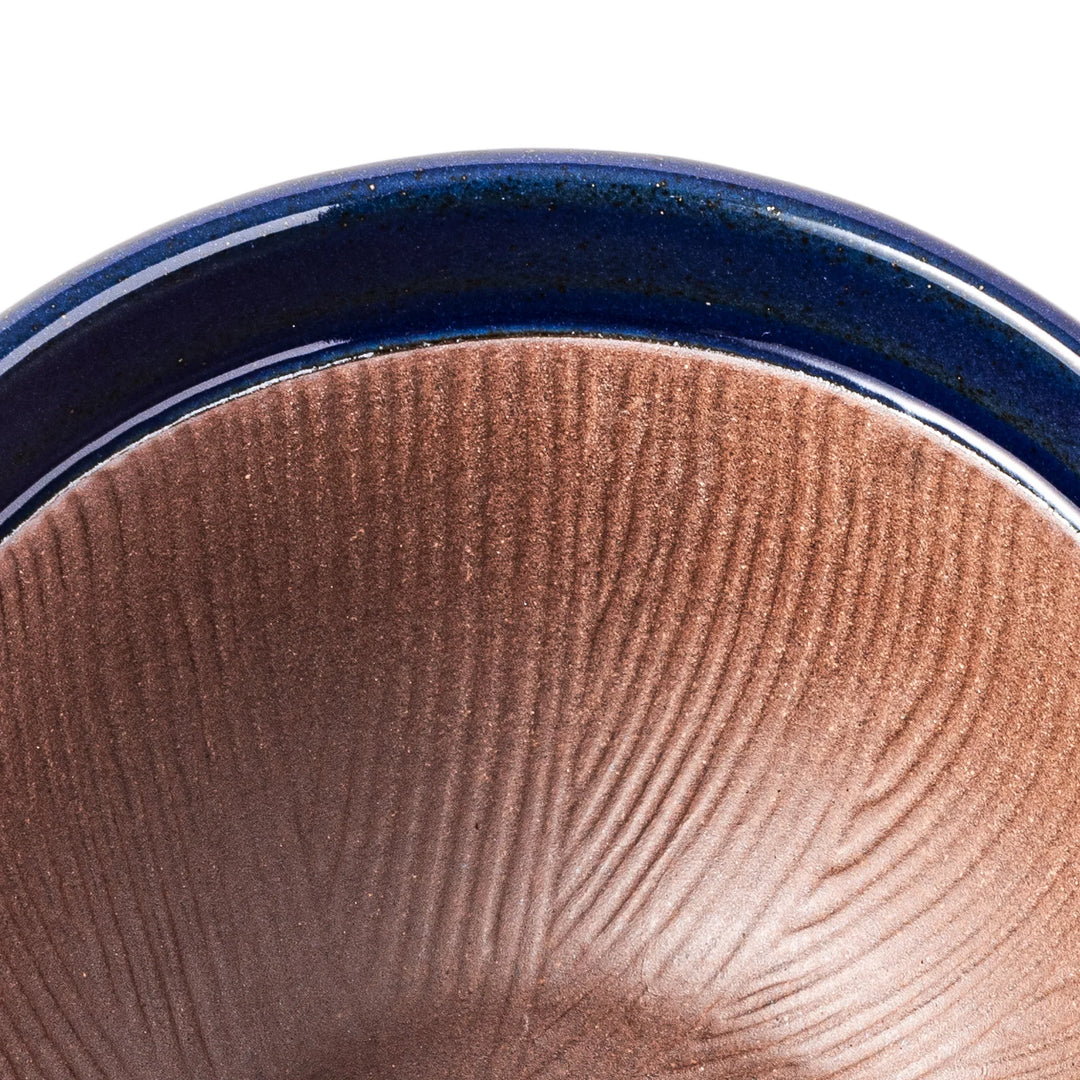Deep blue ceramic natto suribachi bowl with ridged brown interior and side handle, perfect for mixing natto or grinding small ingredients with ease.