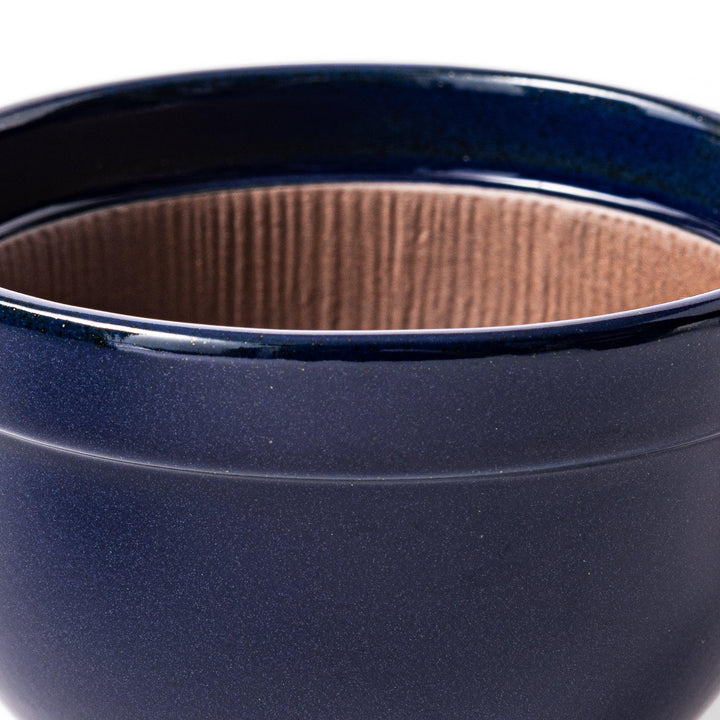 Deep blue ceramic natto suribachi bowl with ridged brown interior and side handle, perfect for mixing natto or grinding small ingredients with ease.