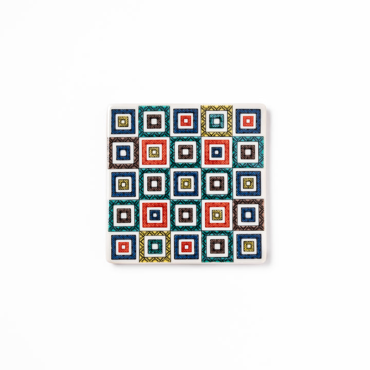 Square Japanese ceramic coaster with colorful cobblestone mosaic pattern in red, blue, green, yellow, and black, ideal for stylish table settings.