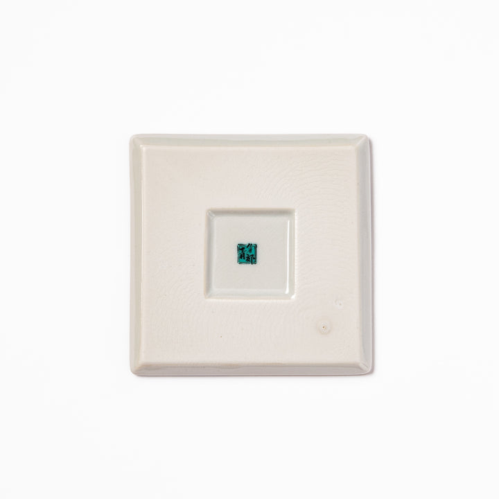 Square Japanese ceramic coaster with colorful cobblestone mosaic pattern in red, blue, green, yellow, and black, ideal for stylish table settings.