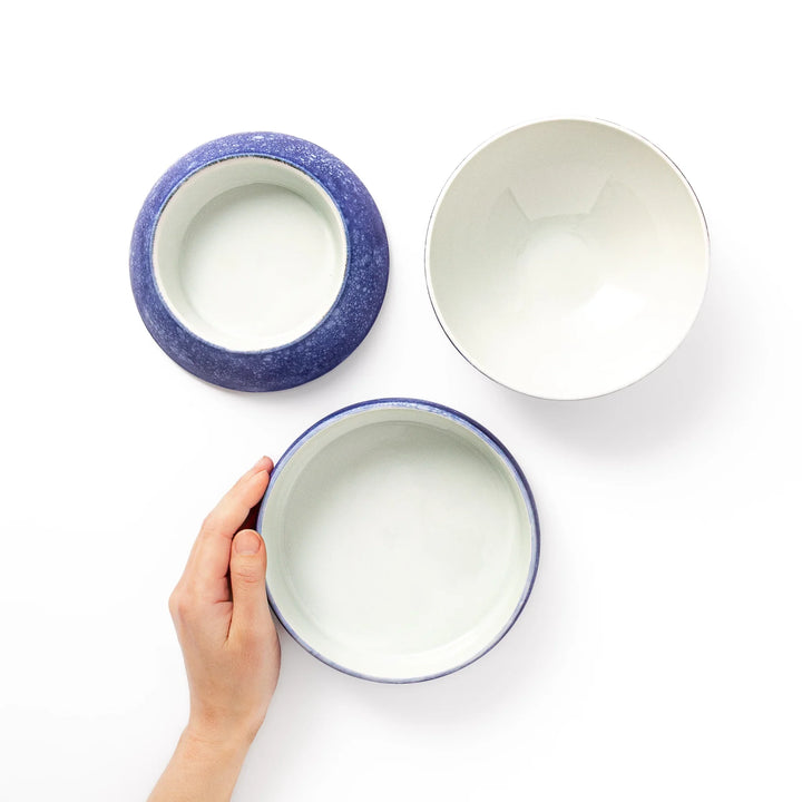 Cosmos blue porcelain moon shaped jubako set shown open with interior bowls