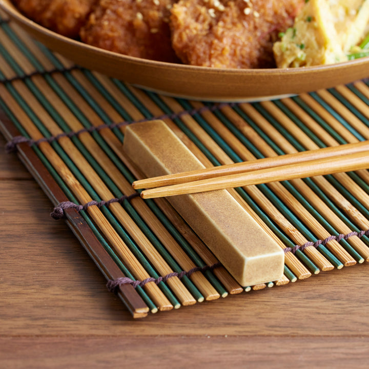 Cozy Japandi Chopstick Rest - Rectangular design with warm earthy glaze, blending function and style for an elegant dining table.
