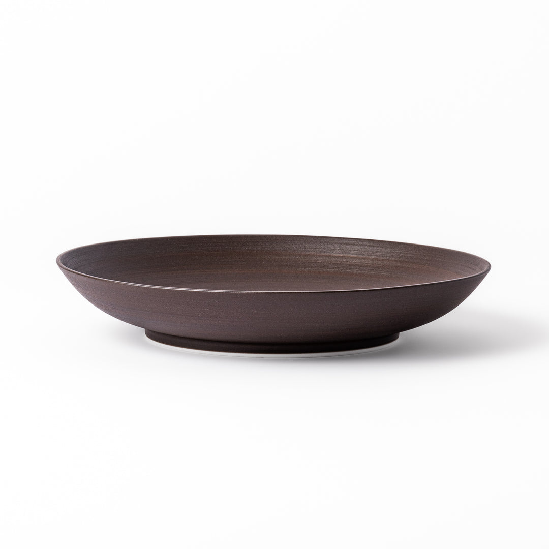 Matte brown ceramic salad plate with subtle swirl lines and a gently raised rim, perfect for modern Japandi table settings.