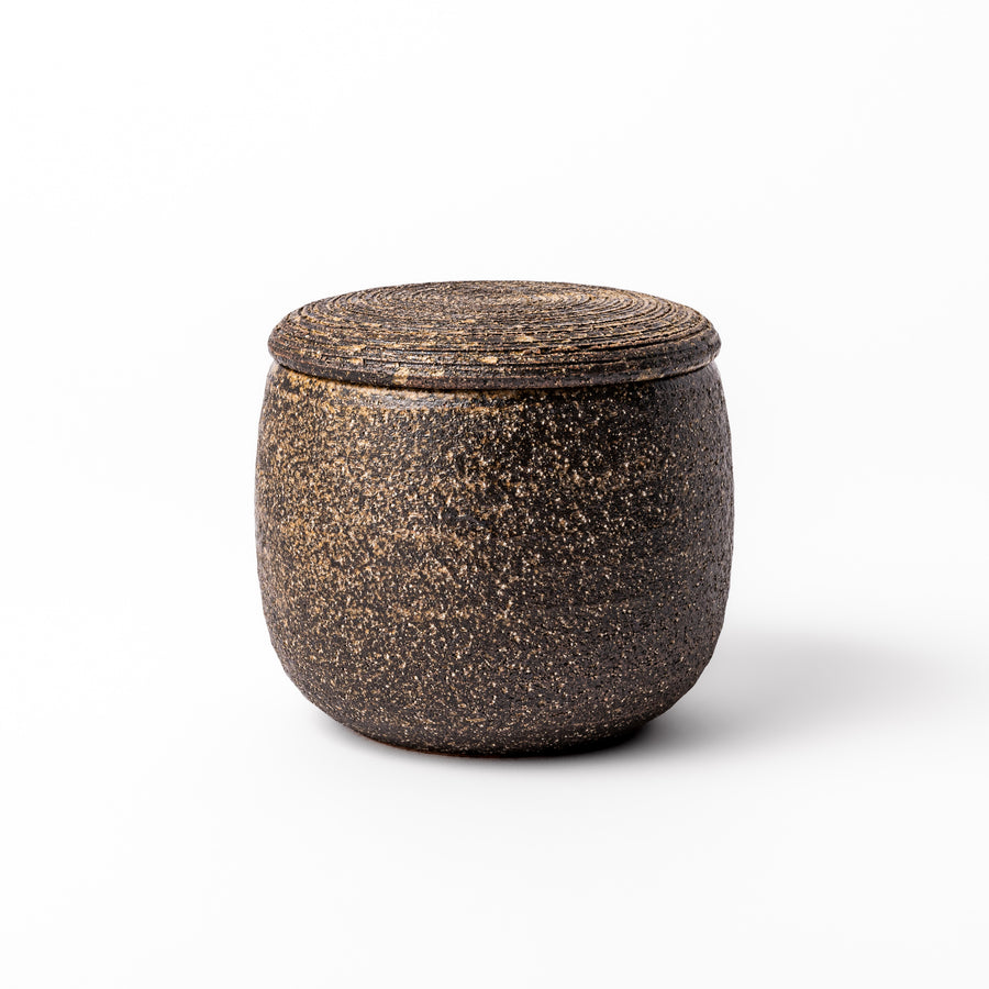 Dark brown ceramic rice storage bowl with matching lid, featuring a textured rustic finish, designed for storing freshly cooked rice.