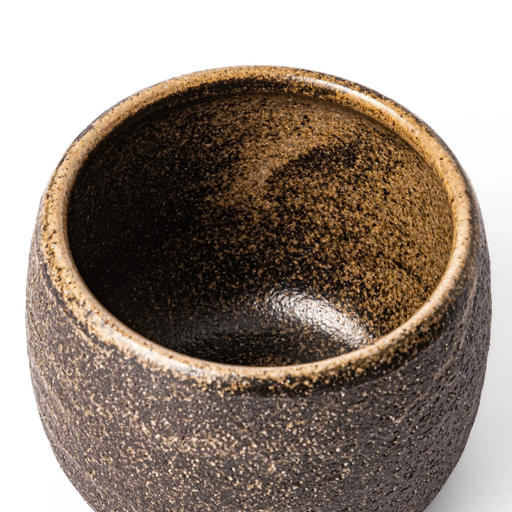 Dark brown ceramic rice storage bowl with matching lid, featuring a textured rustic finish, designed for storing freshly cooked rice.