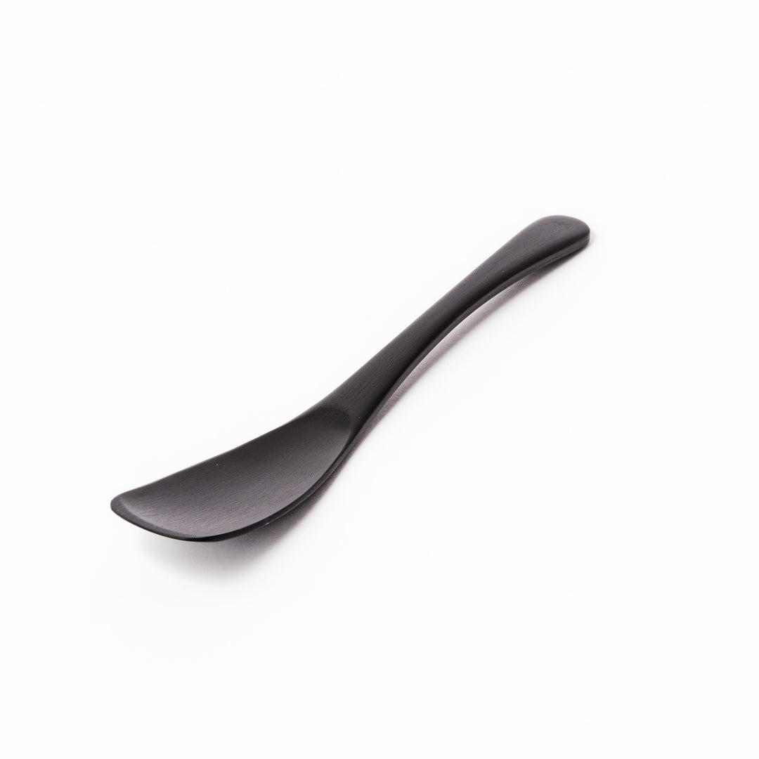 Matte black aluminum ice cream spoon with a flat-edged design, crafted for effortless scooping of firm frozen desserts straight from the freezer.