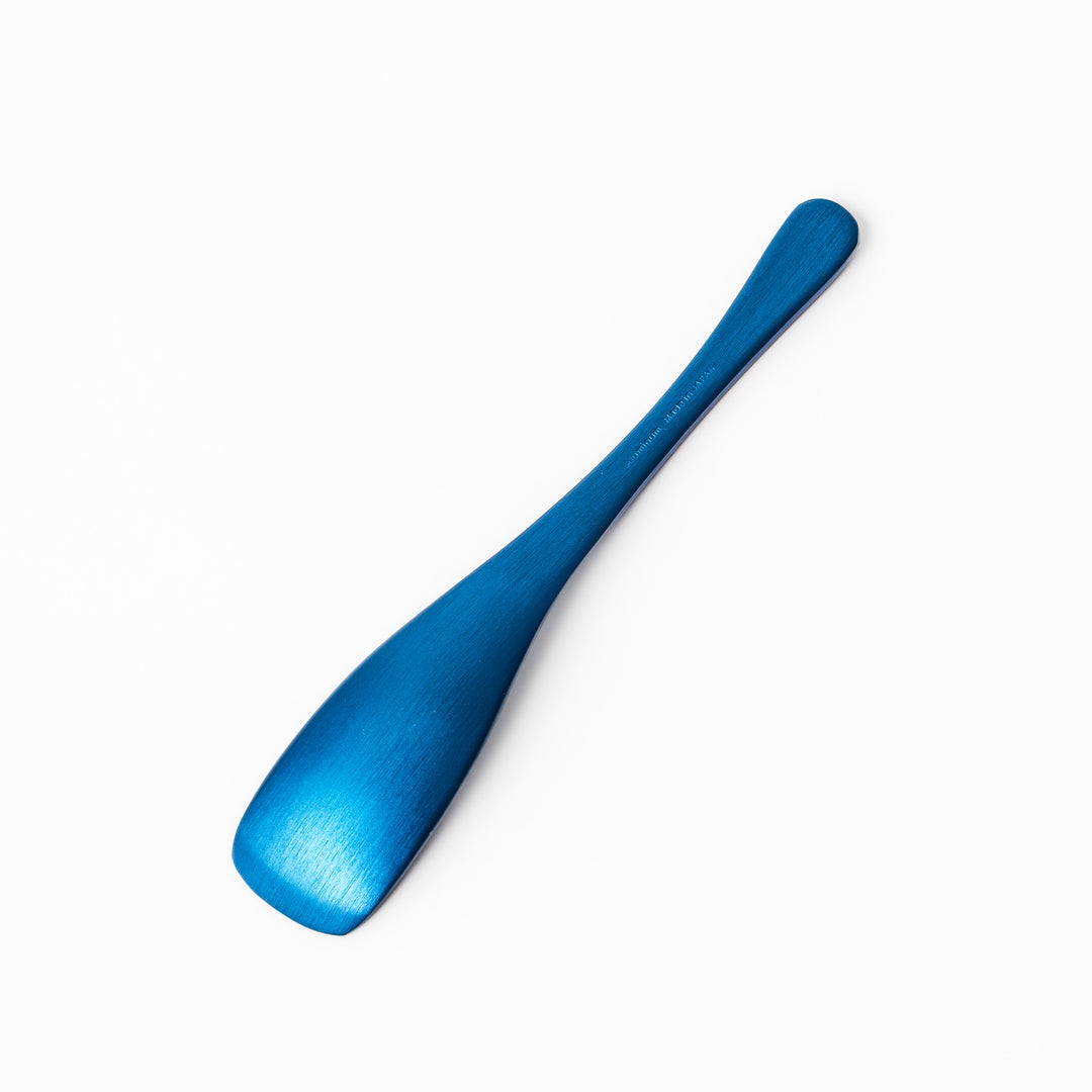 Blue aluminum ice cream spoon with a sleek matte finish and flat tip, designed for smoothly scooping even the hardest frozen treats.