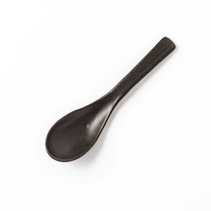 Black ceramic spoon with a smooth, rounded bowl and straight handle, ideal for serving soups, stews, or curry with refined simplicity.