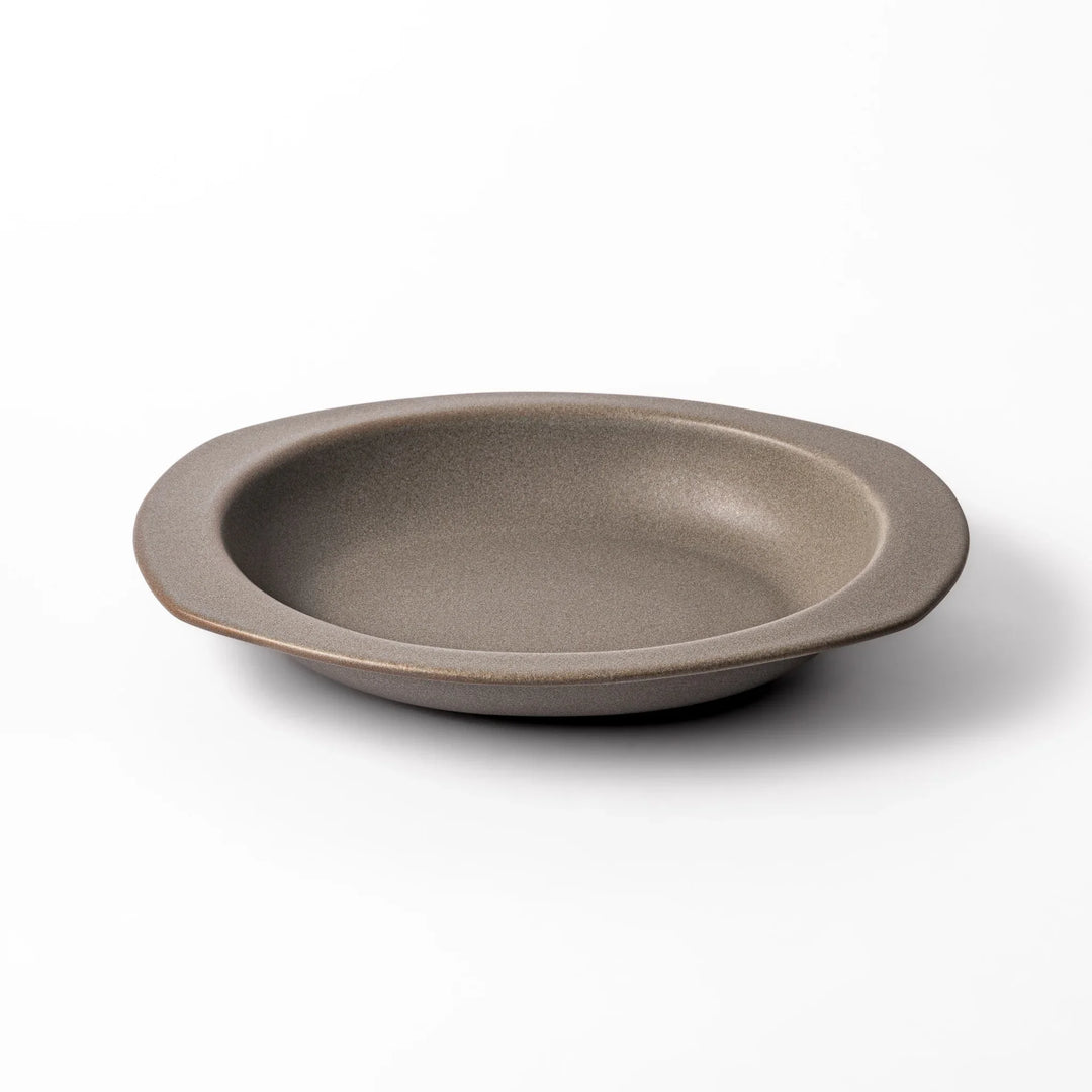 Gray oval ceramic curry plate with gently raised sides and wide rim, designed for easy scooping and serving rice, curry, or stew dishes.