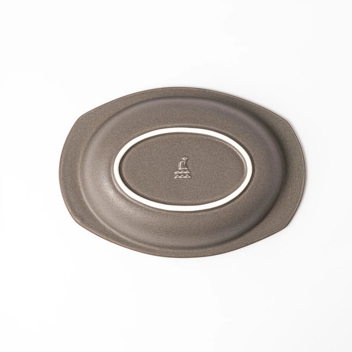 Gray oval ceramic curry plate with gently raised sides and wide rim, designed for easy scooping and serving rice, curry, or stew dishes.