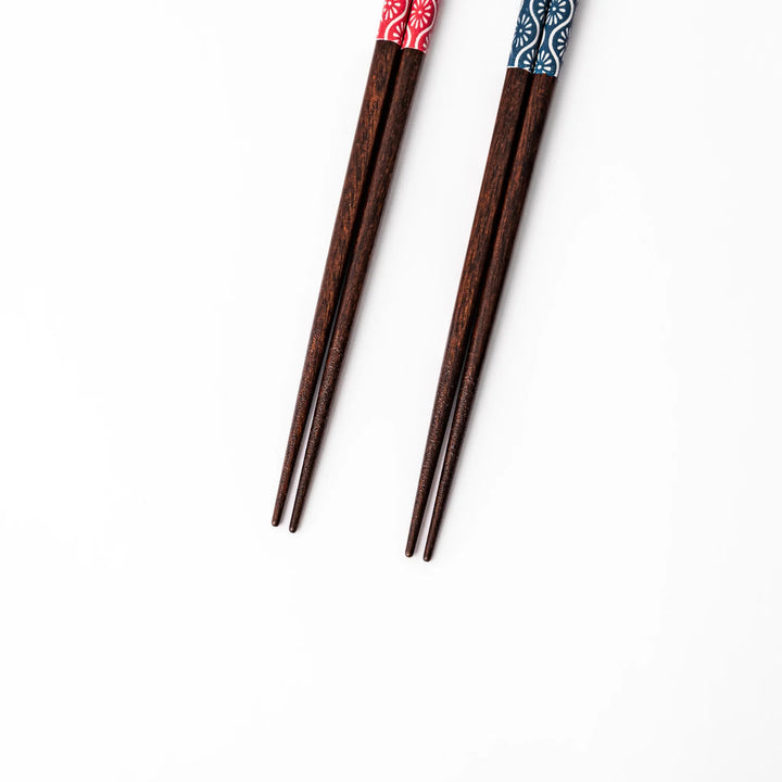 Japanese Edo-style chopsticks and sauce dish set featuring red and blue patterns with playful dinosaur motif gift box.