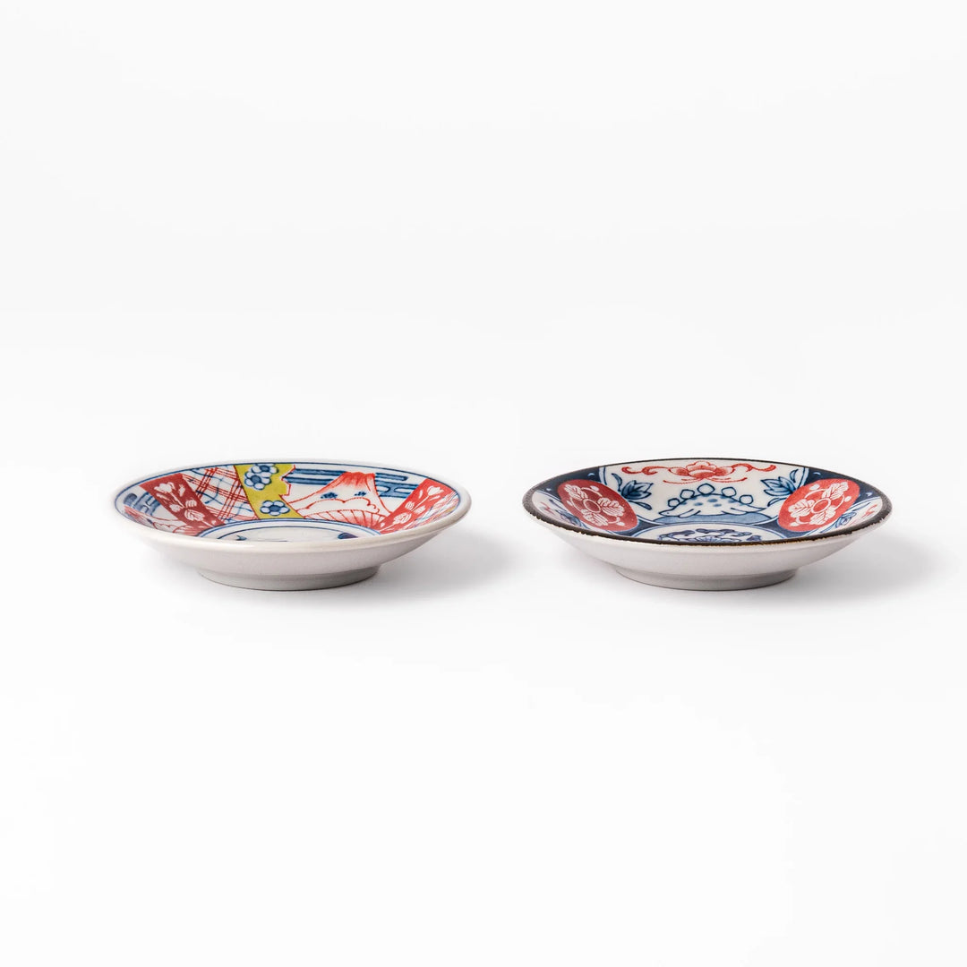 Japanese Edo-style chopsticks and sauce dish set featuring red and blue patterns with playful dinosaur motif gift box.
