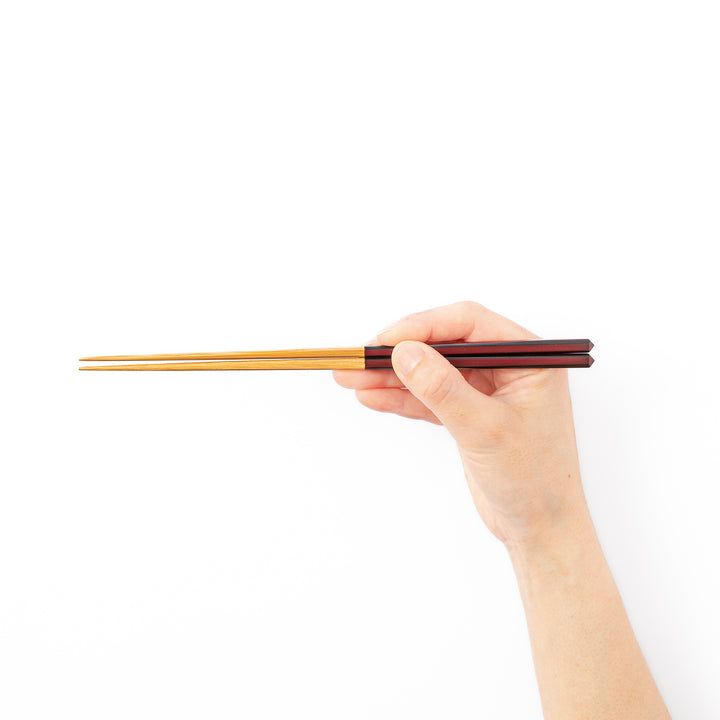 Fine tip Japanese bamboo chopsticks featuring a wine red handle with dark side stripes and a natural bamboo finish