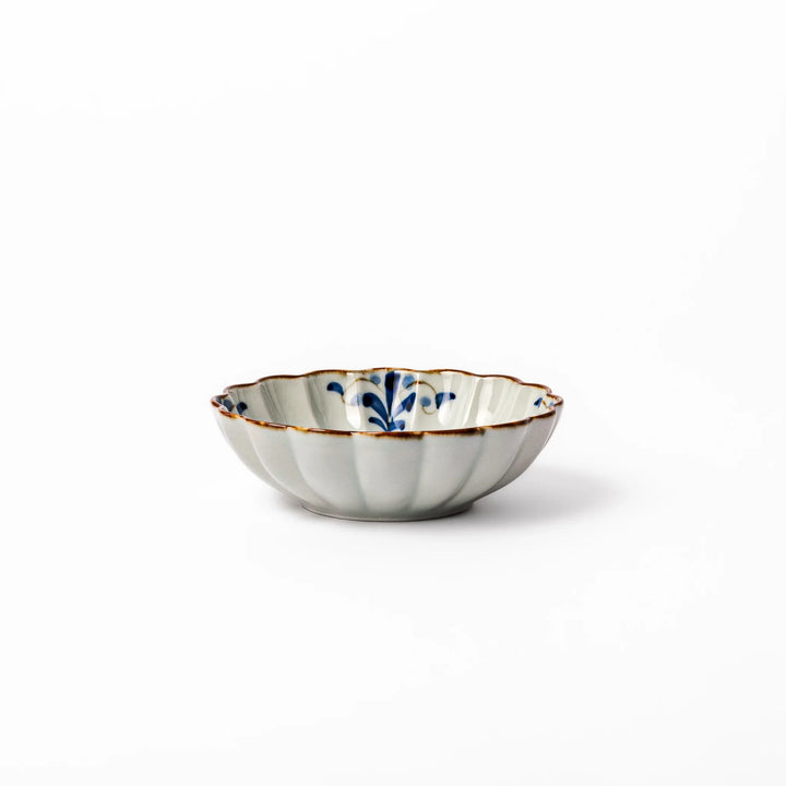 Arita porcelain octagonal cereal bowl with blue floral leaf pattern and gold rim, ideal for rice or soup.