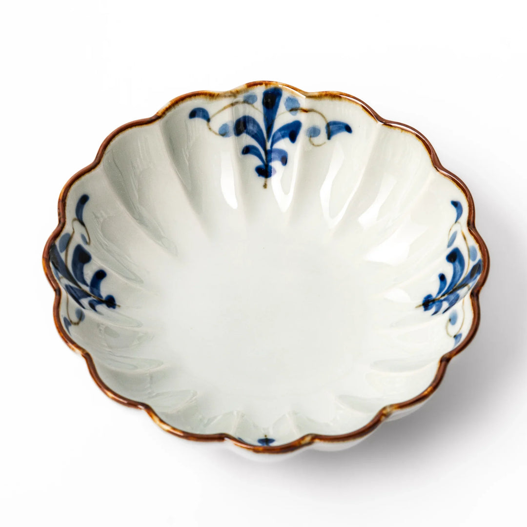 Arita porcelain octagonal cereal bowl with blue floral leaf pattern and gold rim, ideal for rice or soup.