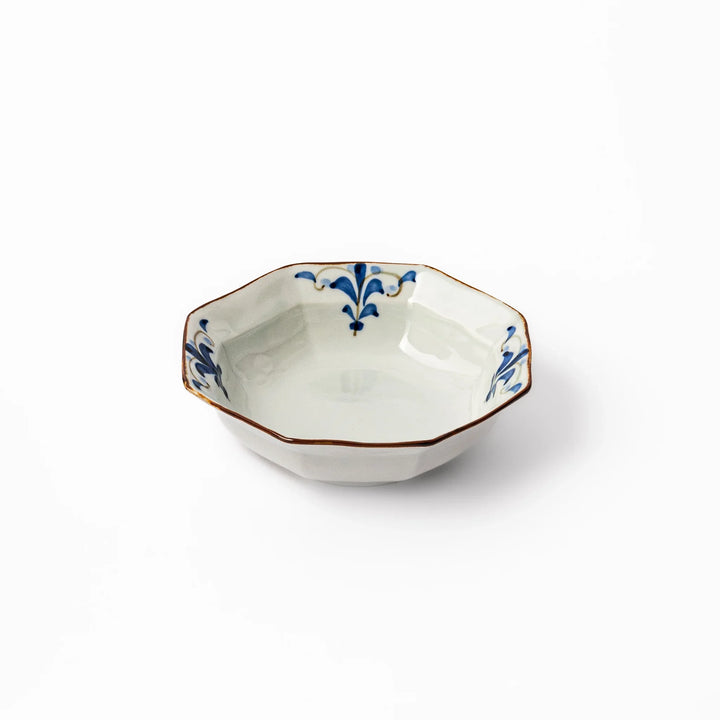 Arita porcelain octagonal cereal bowl with blue floral leaf pattern and gold rim, ideal for rice or soup.