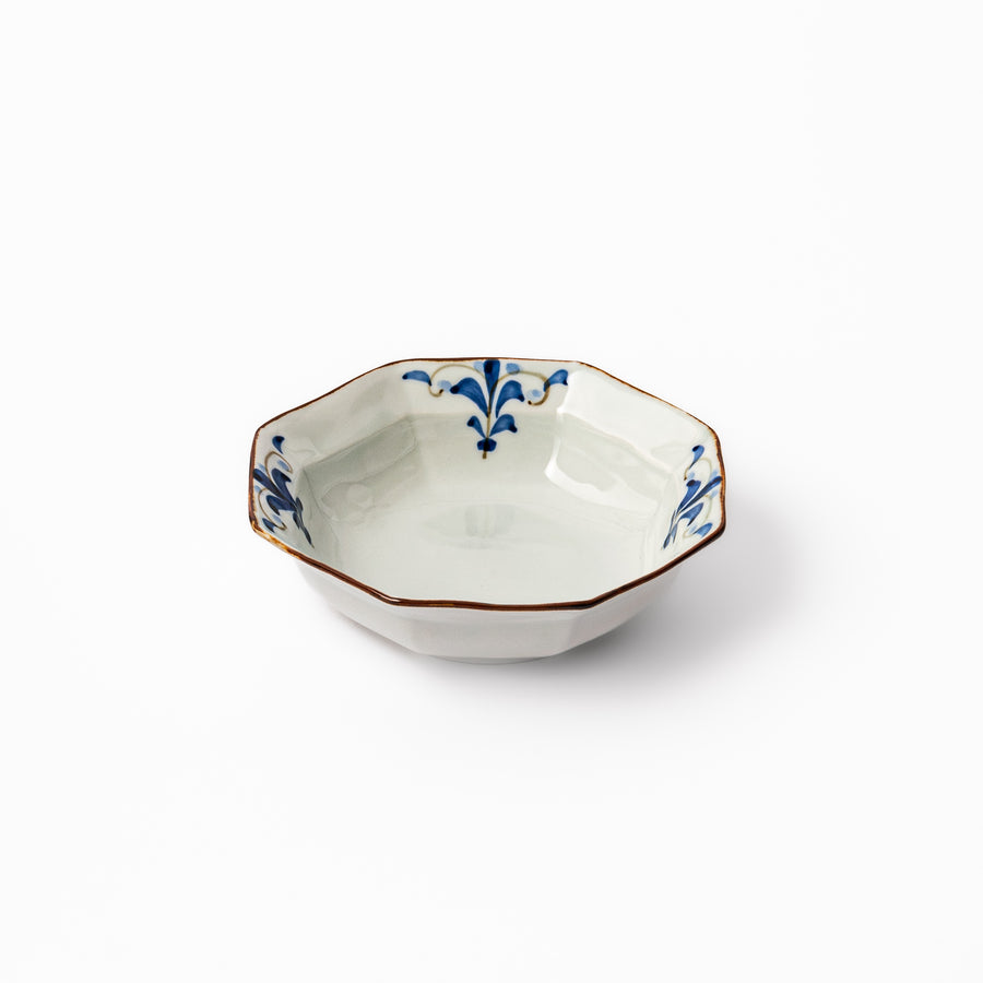 Japanese porcelain octagonal cereal bowl with blue floral leaf design and gold rim, handcrafted in Arita for serving rice, soup, or side dishes.