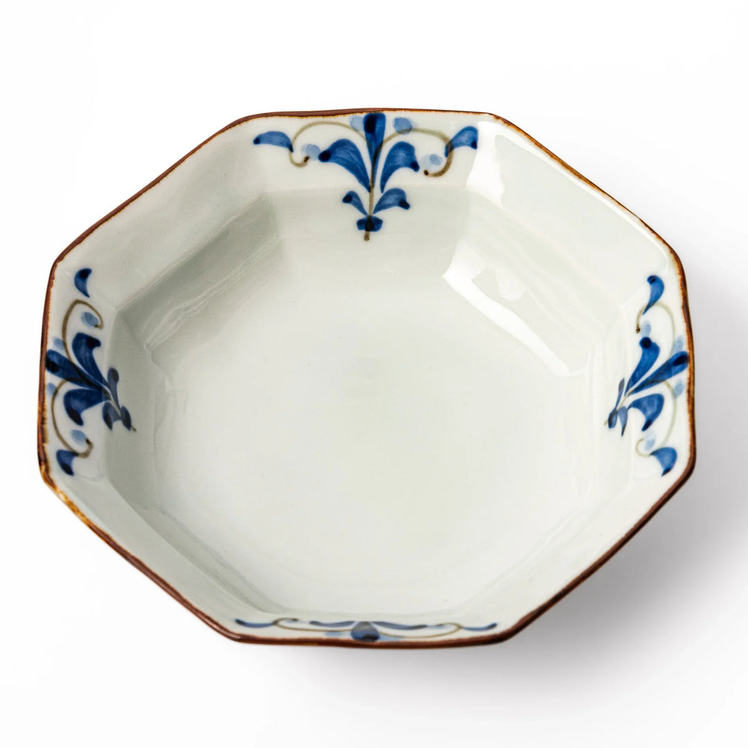Arita porcelain octagonal cereal bowl with blue floral leaf pattern and gold rim, ideal for rice or soup.