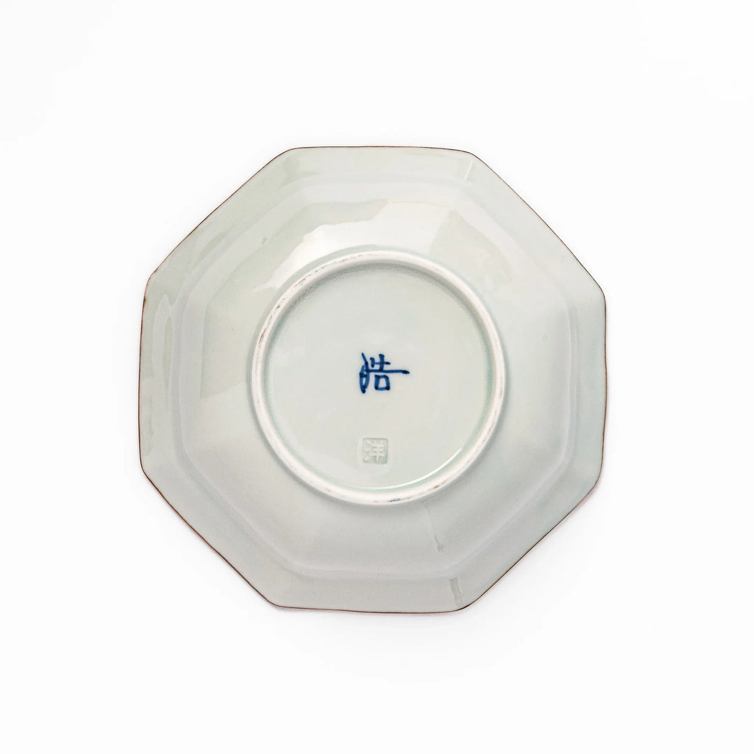 Arita porcelain octagonal cereal bowl with blue floral leaf pattern and gold rim, ideal for rice or soup.