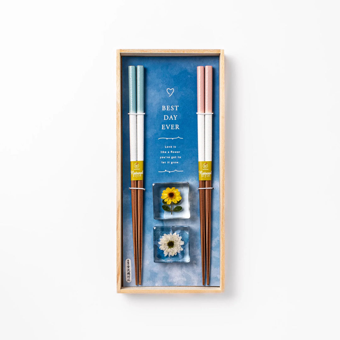Floral-themed Japanese chopsticks gift set with pastel handles and clear rests featuring pressed sunflower and daisy.