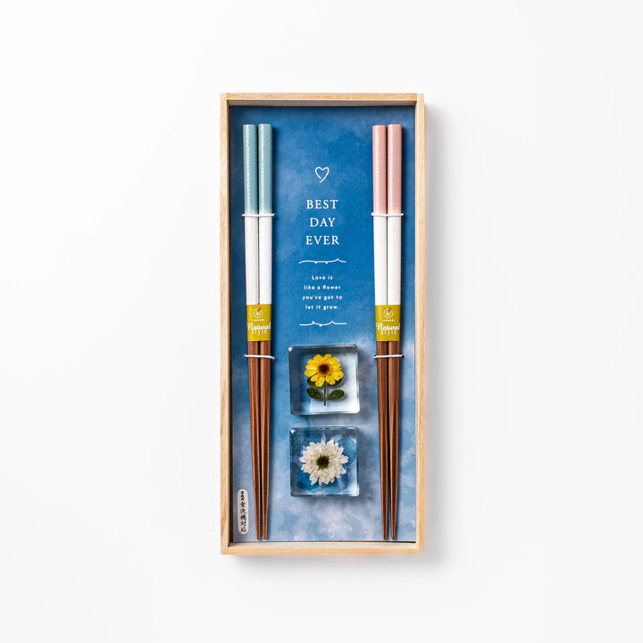 Floral-themed Japanese chopsticks gift set with pastel handles and clear rests featuring pressed sunflower and daisy.