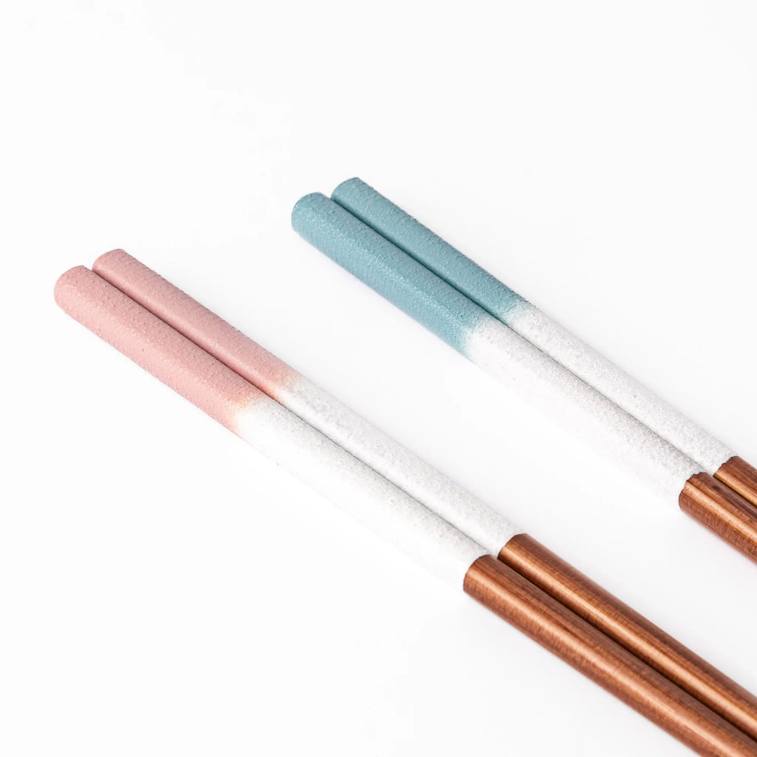 Floral-themed Japanese chopsticks gift set with pastel handles and clear rests featuring pressed sunflower and daisy.