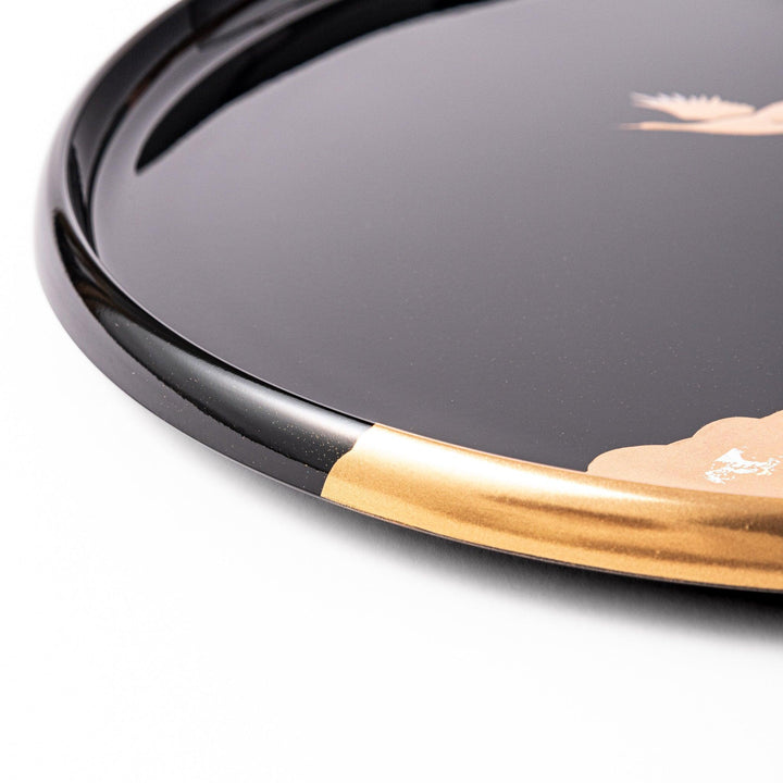 Flying Crane Japanese serving tray with black lacquer base and gold crane and cloud motif for elegant tea.