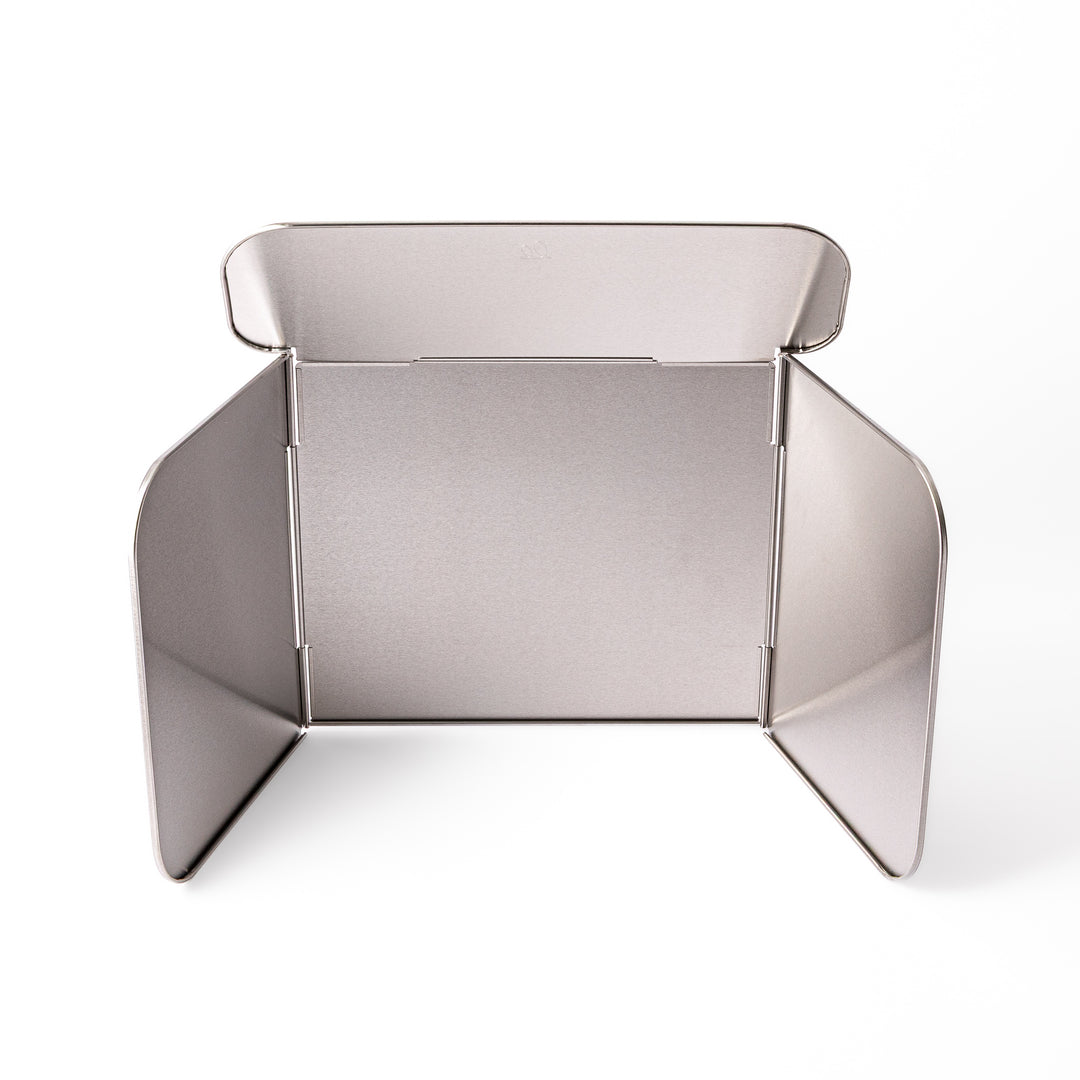 Japanese Foldable Stainless Steel Stove Splatter Guard fully assembled and standing on a white background