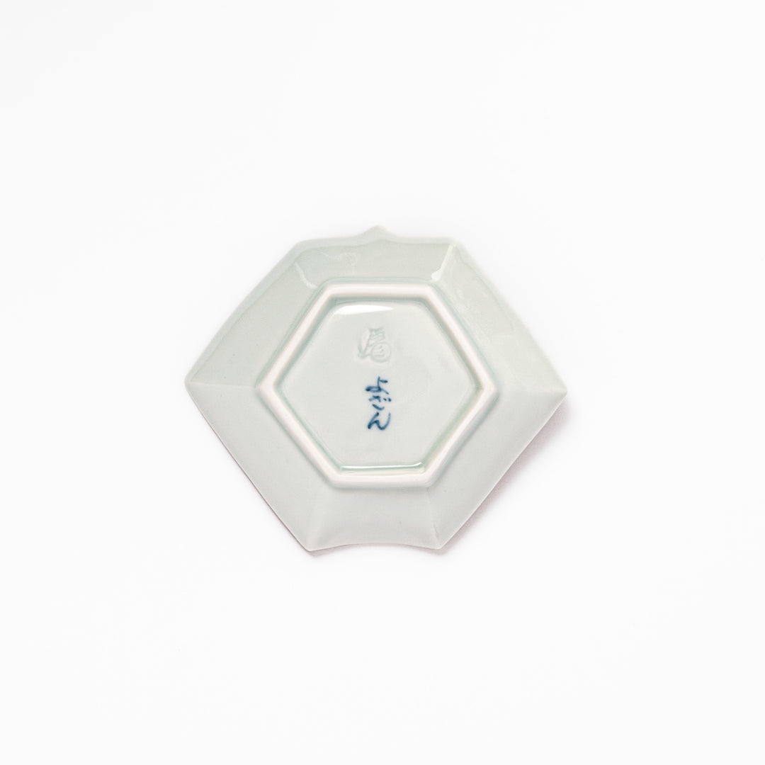 Japanese porcelain origami-shaped sauce dish with geometric circle and floral motifs, handcrafted in Japan for soy sauce, condiments, or appetizers