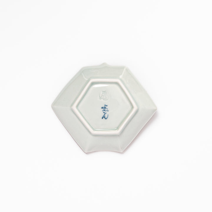 Japanese porcelain origami-shaped sauce dish with geometric circle and floral motifs, handcrafted in Japan for soy sauce, condiments, or appetizers
