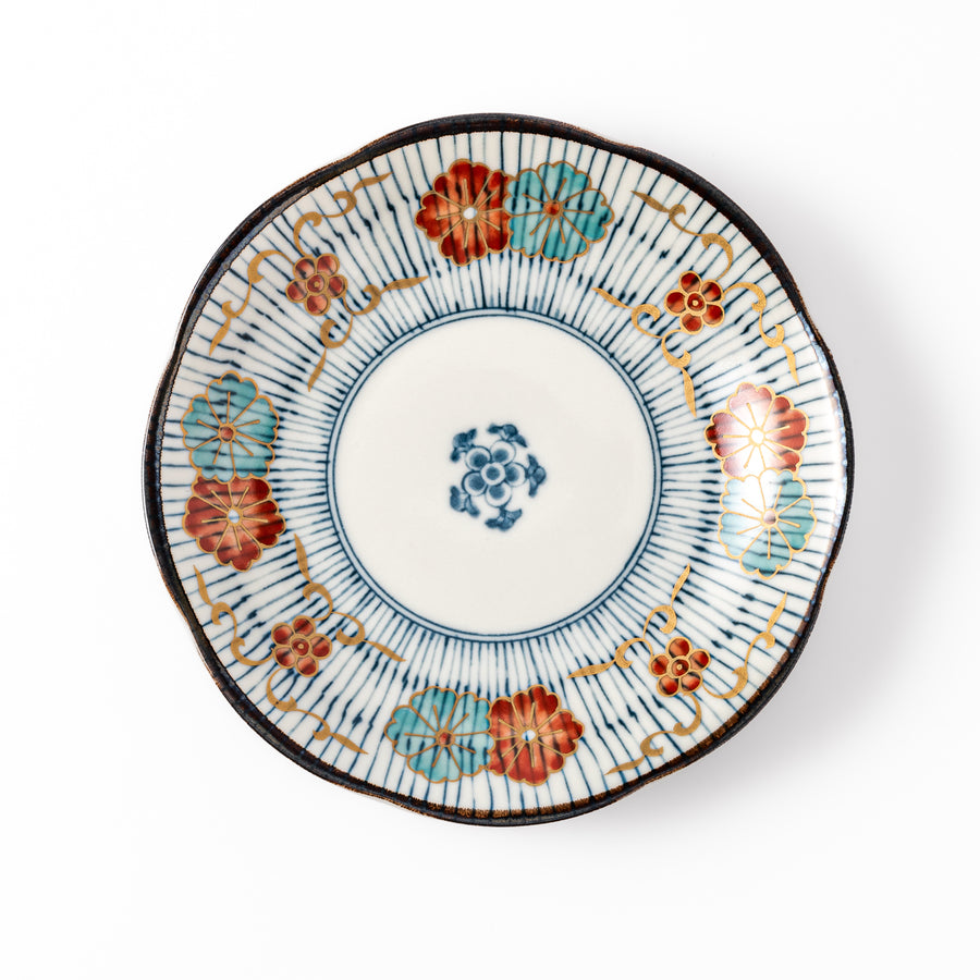 Scalloped Japanese dessert plate with vertical blue stripes and red, teal, and gold floral accents, perfect for serving sweets or small treats in style.