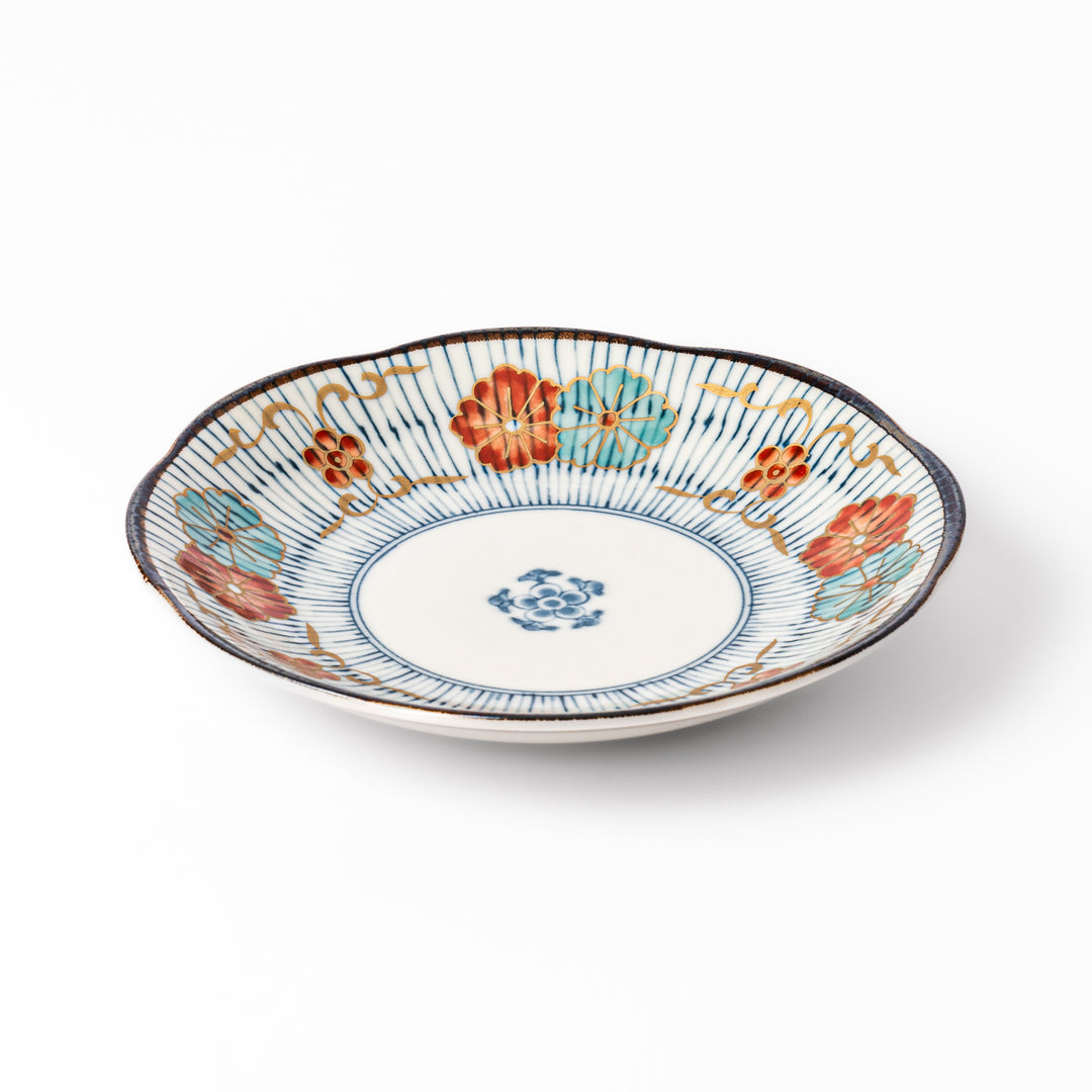 Scalloped Japanese dessert plate with vertical blue stripes and red, teal, and gold floral accents, perfect for serving sweets or small treats in style.