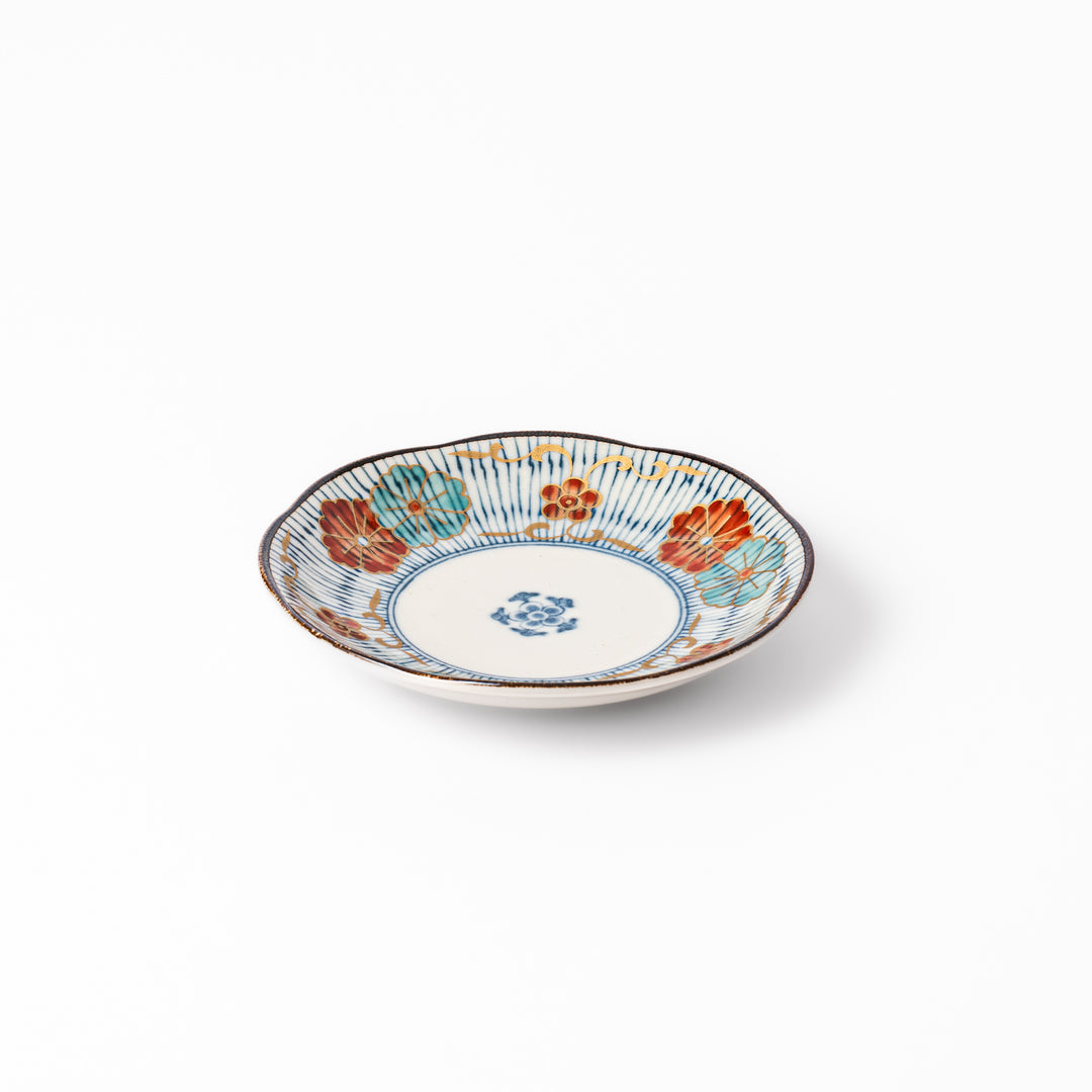 Scalloped edge Japanese sauce dish with vertical blue stripes and red, teal, and gold floral motifs, ideal for serving condiments with elegance.