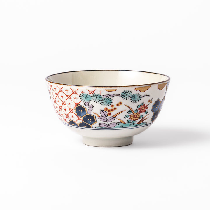 Traditional Japanese rice bowl featuring red lattice, navy hexagons, and multicolor floral motifs, perfect for adding elegance to everyday meals.
