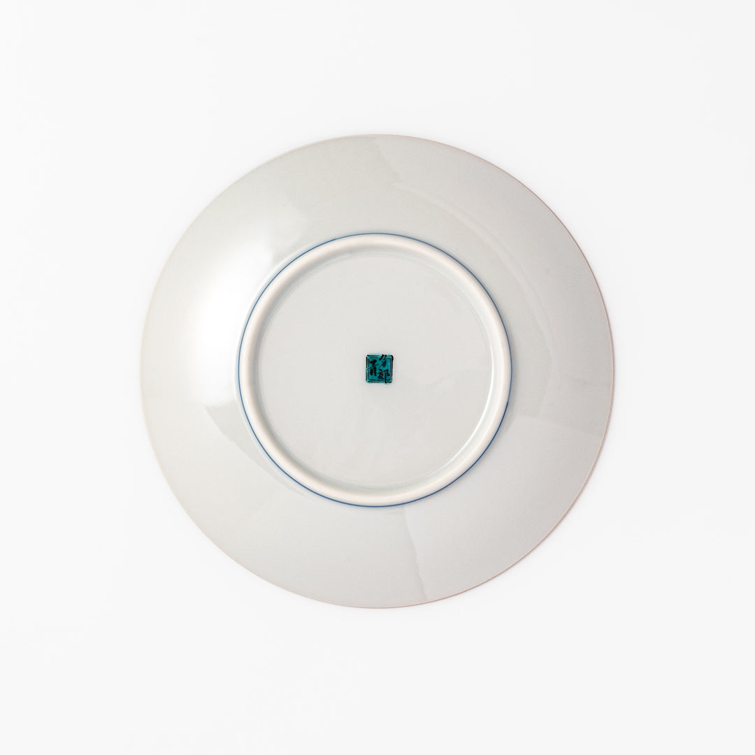 Round Kutani dessert plate with a bold golden leaf and grape motif on a turquoise background patterned with black starbursts.