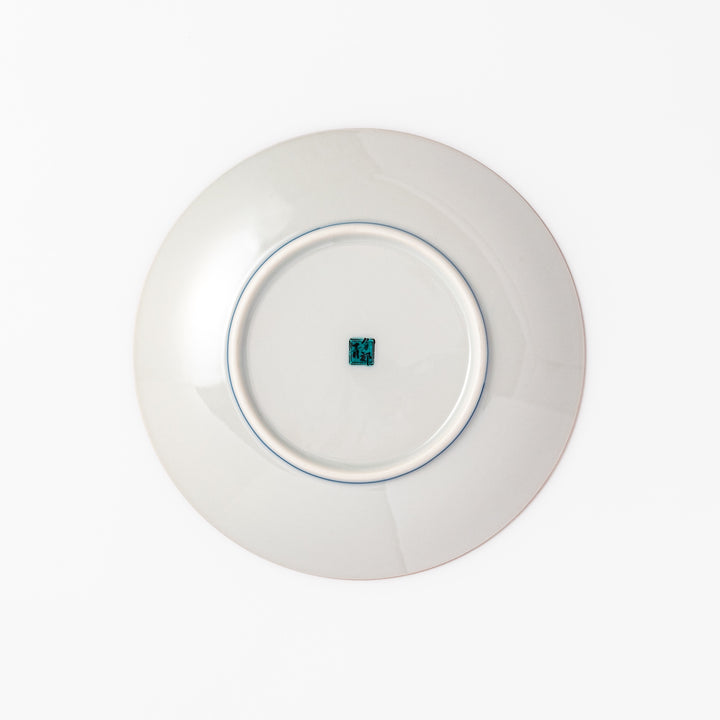 Round Kutani dessert plate with a bold golden leaf and grape motif on a turquoise background patterned with black starbursts.