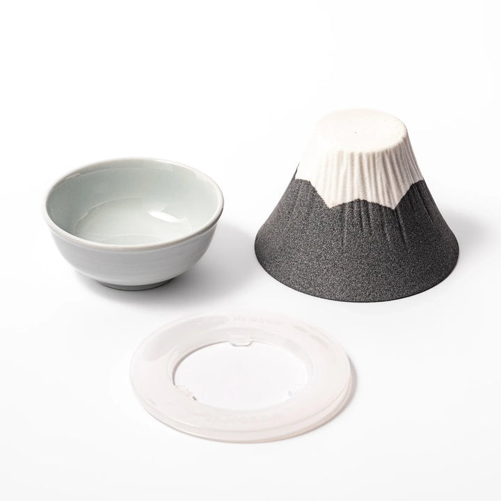 Black Mount Fuji ceramic coffee filter with snowy peak design, handcrafted in Japan for reusable pour-over brewing and stylish kitchen decor.
