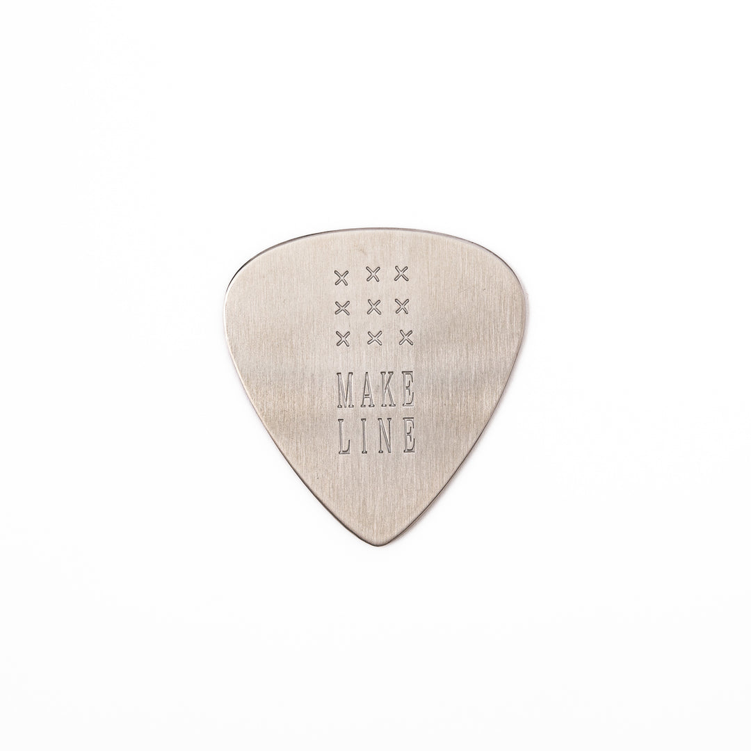 Unique guitar pick shaped stainless steel metal coaster engraved with make line text and cross patterns