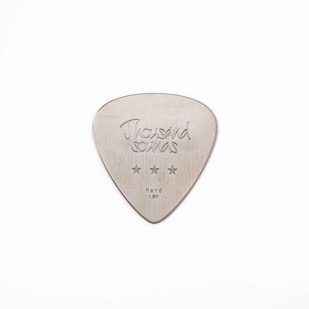 Unique guitar pick shaped stainless steel metal coaster engraved with thousand sounds text and stars